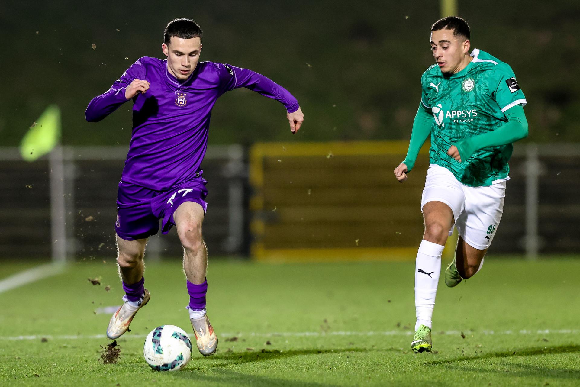 RSCA Futures' Milan Robberechts and Lommel's Mo Salah El Boukammiri fight for the ball during a soccer match between RSCA Futures and Lommel SK, in Deinze, on day 22 of the 2024-2025 'Challenger Pro League' 1B second division of the Belgian championship, Saturday 15 February 2025. BELGA PHOTO BRUNO FAHY