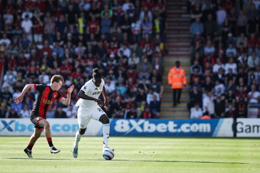 Bournemouth's English midfielder #08 Alex Scott (L) fights for the ball with Aston Villa's Belgian defender #24 Amadou Onana during the English Premier League football match between Bournemouth and Aston Villa at the Vitality Stadium in Bournemouth, southern England on May 10, 2025.  Adrian Dennis / AFP