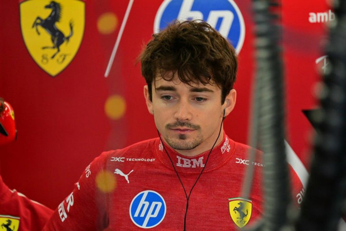 Ferrari's Monegasque driver Charles Leclerc in the garage during the third practice session ahead of the Formula One British Grand Prix at the Silverstone motor racing circuit in Silverstone, central England, on July 5, 2025.  Andrej ISAKOVIC / AFP