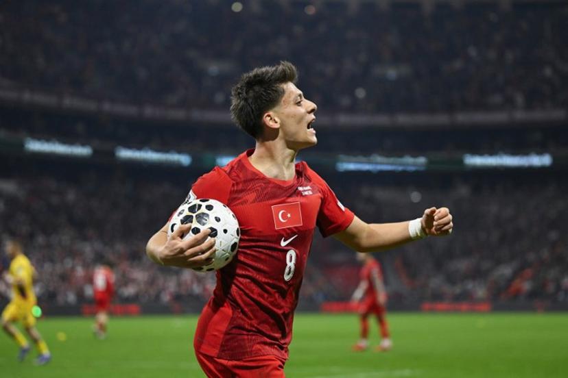 Turkey's midfielder #08 Arda Guler reacts during the play-off FIFA World Cup 2026 European qualification knockout semi-final football match between Turkey and Romania at Besiktas Park stadium, in Istanbul on March 26, 2026.  YASIN AKGUL / AFP