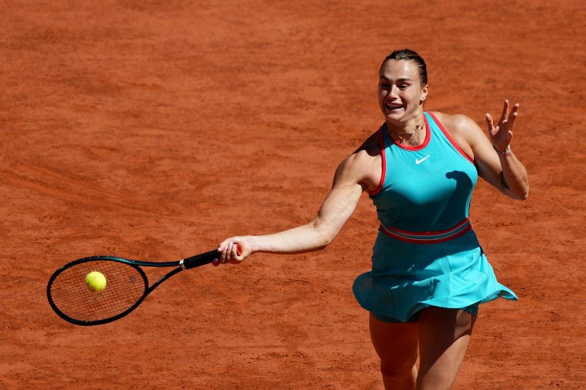 Belarus' Aryna Sabalenka plays a forehand return to Serbia's Olga Danilovic during their women's singles match on day 6 of the French Open tennis tournament on Court Philippe-Chatrier at the Roland-Garros Complex in Paris on May 30, 2025.  Dimitar DILKOFF / AFP