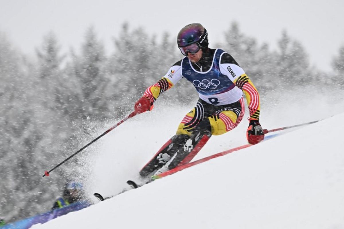 Belgium's Armand Marchant competes in the first run of the men's slalom alpine skiing event during the Milano Cortina 2026 Winter Olympic Games at the Stelvio Ski Centre in Bormio (Valtellina) on February 16, 2026.  Fabrice COFFRINI / AFP