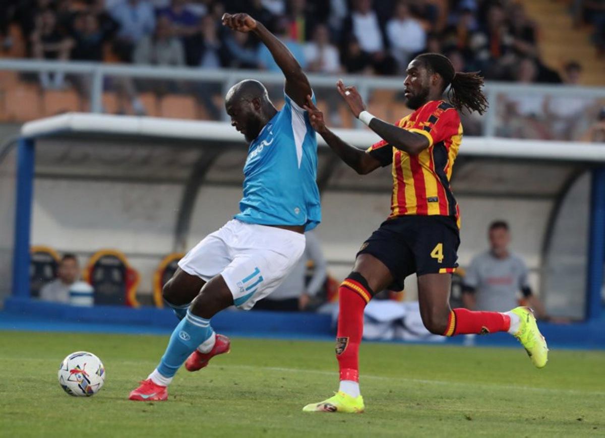 Napoli's Belgian forward #11 Romelu Lukaku fights for the ball with Lecce's Angolan defender #4 Kialonda Gaspar during the Italian Serie A football match between Lecce and Napoli at the comunal stadium in Lecce on May 3, 2025.  CARLO HERMANN / AFP