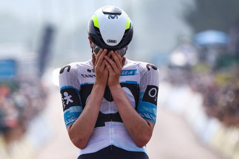 Movistar Team's Spanish rider Ivan Romeo Abad celebrates as he crosses the finish line to win the 3rd stage of the 77th edition of the Criterium du Dauphine cycling race, 207,2 km between Brioude and Charantonnay, on June 10, 2025.  Anne-Christine POUJOULAT / AFP