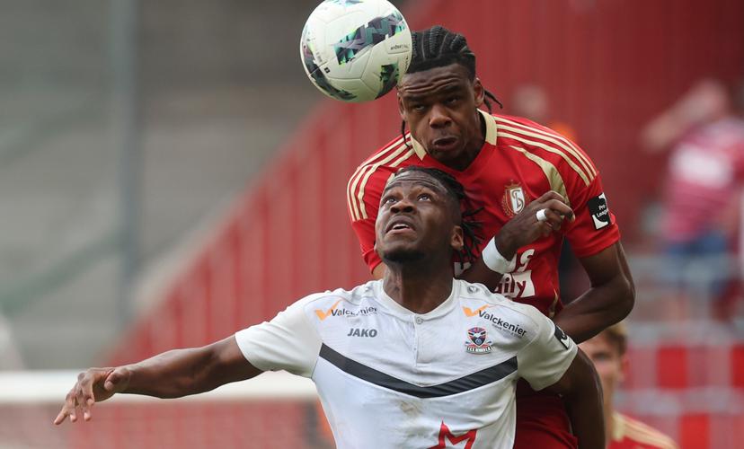 Dender's Bruny Nsimba and Standard's Nathan Ngoy fight for the ball during a soccer match between Standard de Liege and FCV Dender EH, Saturday 17 May 2025 in Liege, on day 9 (out of 10) of the Europe Play-offs of the 2024-2025 'Jupiler Pro League' first division of the Belgian championship. BELGA PHOTO VIRGINIE LEFOUR