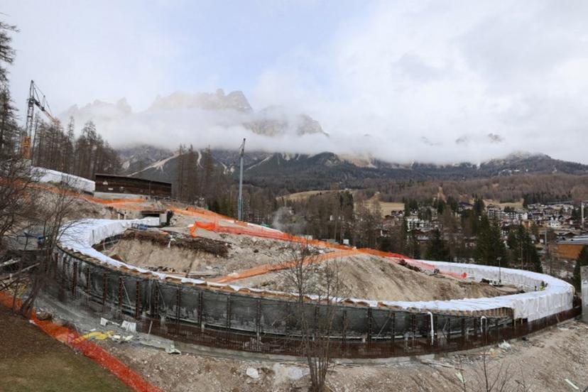 A general view shows the work site of the new Cortina Sliding Centre during its pre-approval testing process ahead of the Olympic Winter Games Milano Cortina 2026, in Cortina on March 25, 2025.  Dozens of bobsleigh, luge and skeleton athletes will take to the track in Cortina d'Ampezzo for the first time, carrying out a series of test runs over its 1,749 metres and 16 turns. Pierre TEYSSOT / AFP