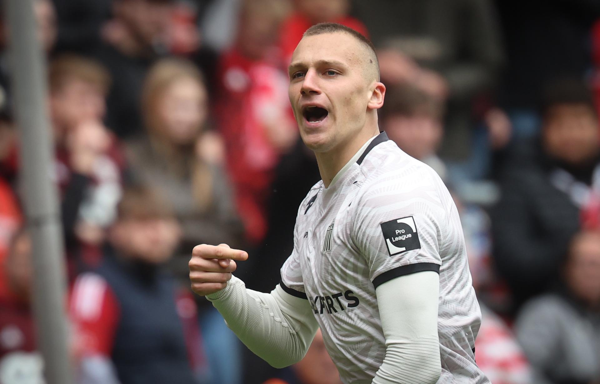 Charleroi's Nikola Stulic celebrates after scoring during a soccer match between Standard de Liege and Sporting Charleroi, Sunday 04 May 2025 in Liege, on day 7 (out of 10) of the Europe Play-offs of the 2024-2025 'Jupiler Pro League' first division of the Belgian championship. BELGA PHOTO VIRGINIE LEFOUR