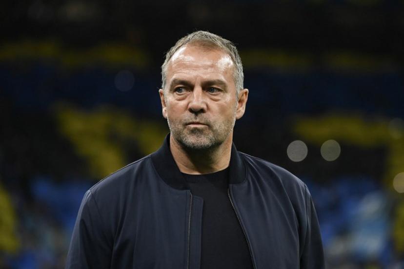 Barcelona's German coach Hans-Dieter Flick looks on before the start of the UEFA Champions League semi-final second leg football match between Inter Milan and FC Barcelona at the San Siro stadium in Milan on May 6, 2025.  PIERO CRUCIATTI / AFP