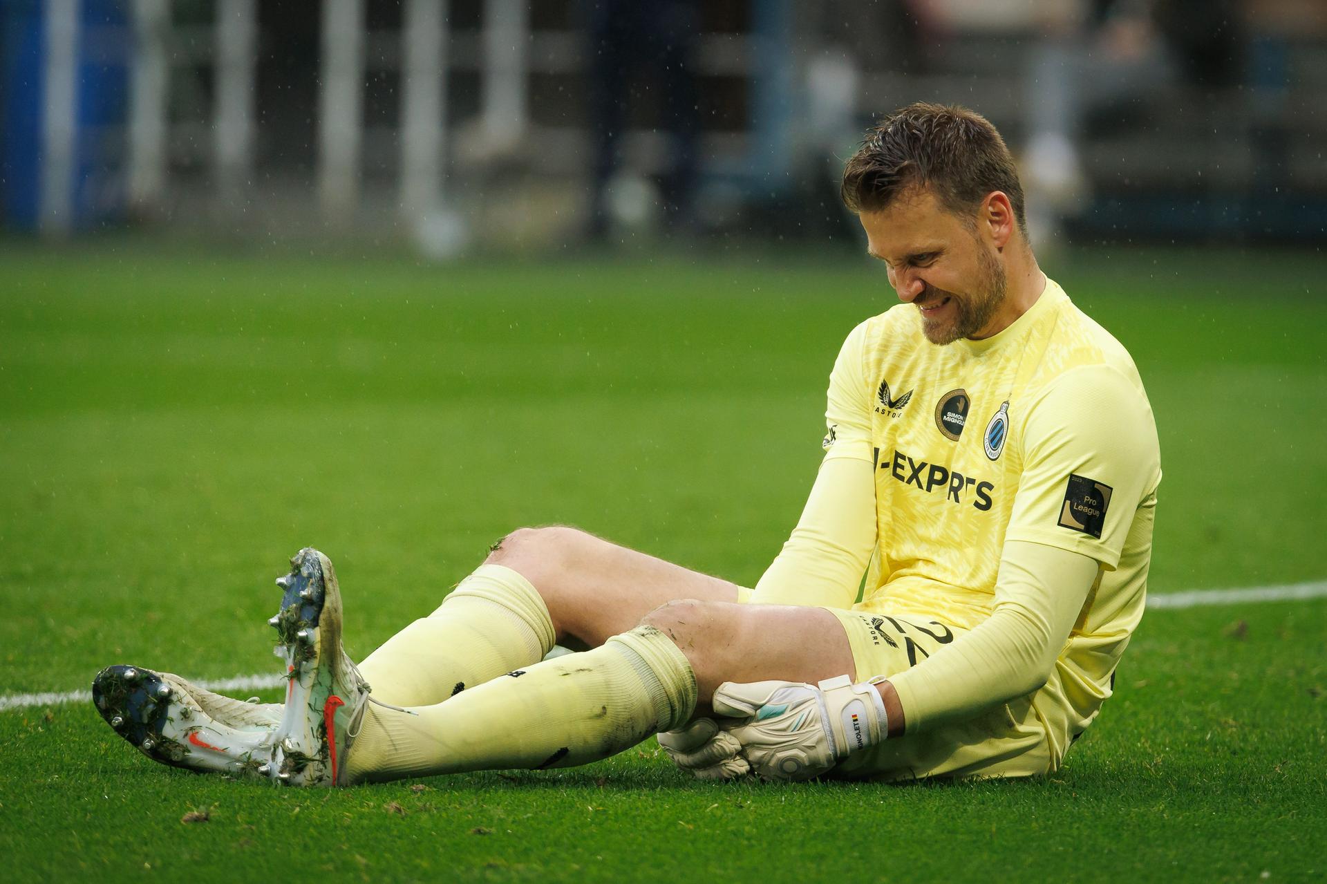 Club's goalkeeper Simon Mignolet lies injured on the ground during a soccer match between KAA Gent and Club Brugge, Sunday 20 April 2025 in Gent, on day 4 (out of 10) of the Champions' Play-offs of the 2024-2025 'Jupiler Pro League' first division of the Belgian championship. BELGA PHOTO KURT DESPLENTER