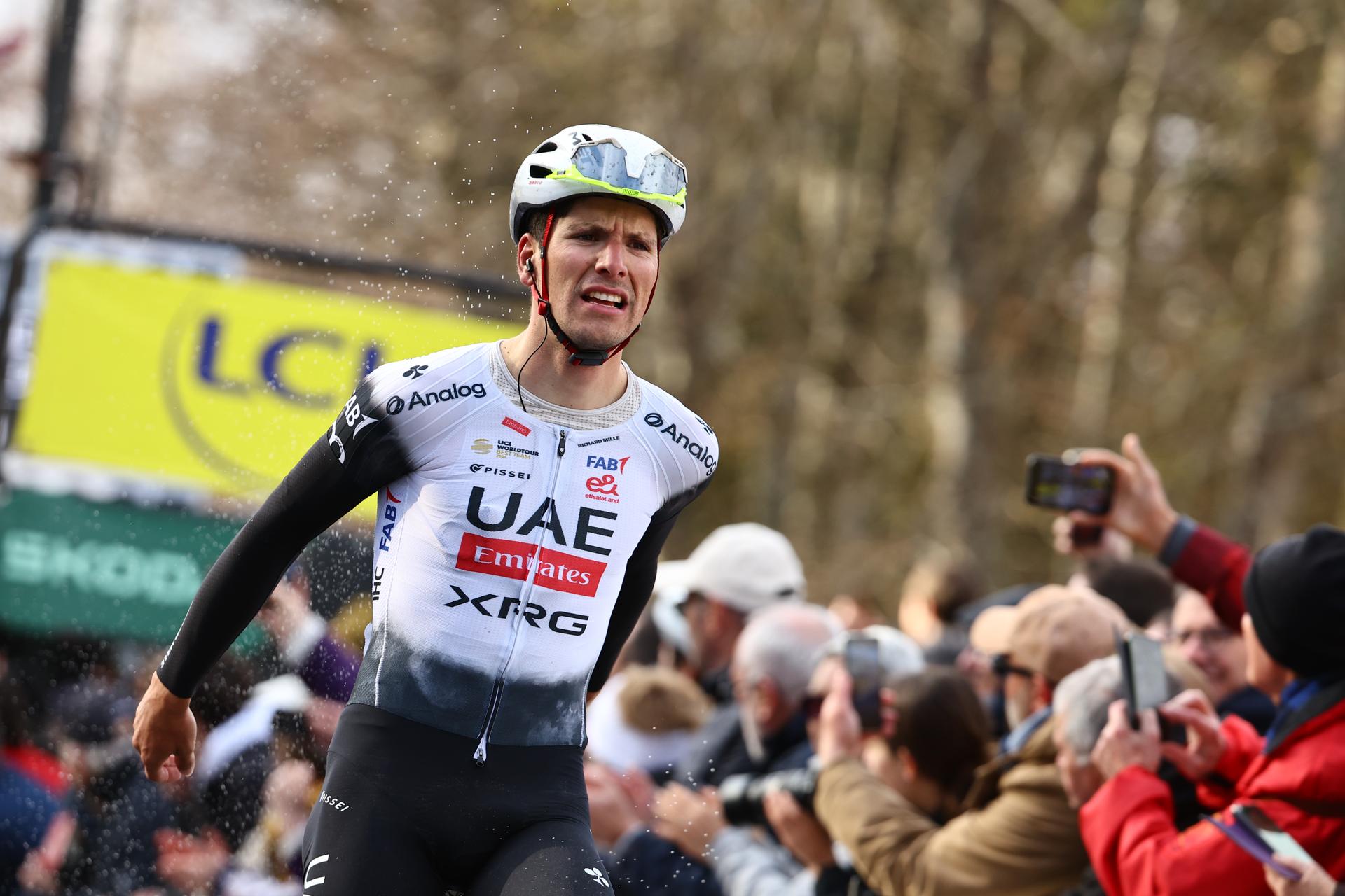 Portuguese Joao Almeida of UAE Team Emirates celebrates after winning stage four of the 83th edition of the Paris-Nice cycling race, 163,4km from Vichy to La Loge des Gardes, France, Wednesday 12 March 2025. BELGA PHOTO DAVID PINTENS