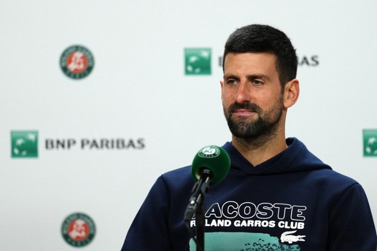 Serbia's Novak Djokovic holds a press conference after he lost his men's singles semi-final match against Italy's Jannik Sinner on day 13 of the French Open tennis tournament on Court Philippe-Chatrier at the Roland-Garros Complex in Paris on June 6, 2025.  Dimitar DILKOFF / AFP