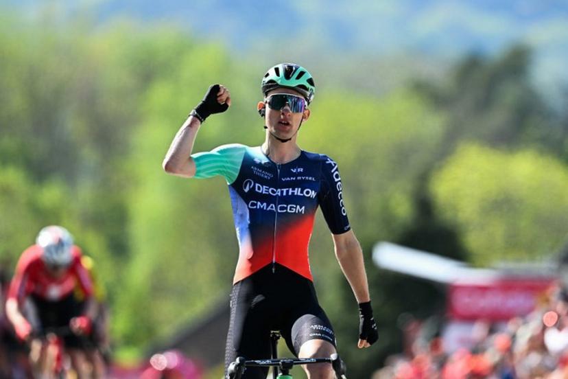 Decathlon CMA CGM Team's French Paul Seixas celebrates as he crosses the finish line to win 'La Fleche Wallonne' one day cycling race, 200 km from Herstal to Huy, on April 22, 2026.  JOHN THYS / AFP