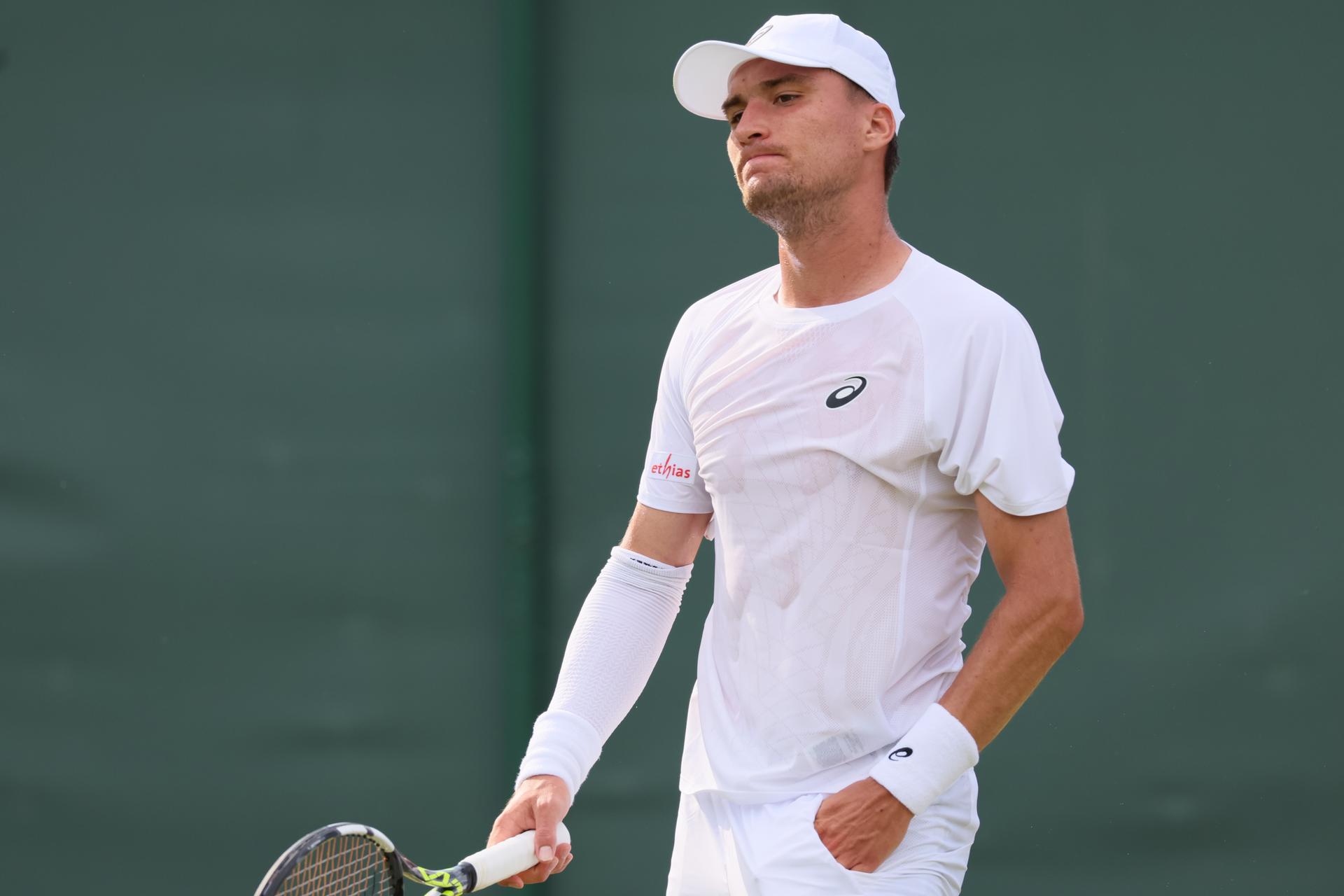 Belgian Raphael Collignon pictured in action at a tennis game against Croatian Cilic, in the first round of the men's singles at the 2025 Wimbledon grand slam tournament, Tuesday 01 July 2025 at the All England Tennis Club, in South-West London, Britain. BELGA PHOTO BENOIT DOPPAGNE