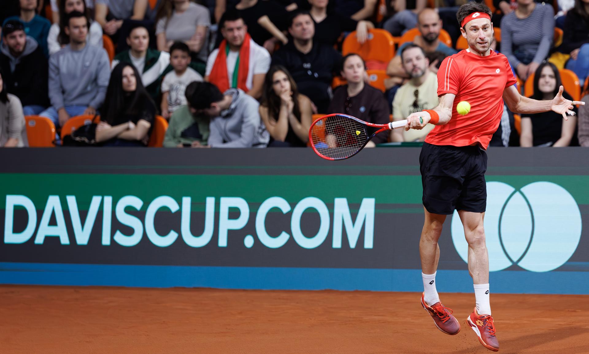 Belgian Sander Gille pictured in action during a doubles tennis match between Bulgarian Donski/Nesterov and Belgian Gille/Vliegen, match 3 of the qualifier of the Davis Cup on Sunday 08 February 2026, in Plovdiv, Bulgaria. Belgium will compete this weekend in the Davis Cup qualifiers against Bulgaria. BELGA PHOTO BENOIT DOPPAGNE