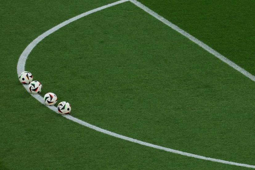 Match balls are set up for warm ups ahead of the UEFA Euro 2024 Group E football match between Ukraine and Belgium at the Stuttgart Arena in Stuttgart on June 26, 2024.  LLUIS GENE / AFP