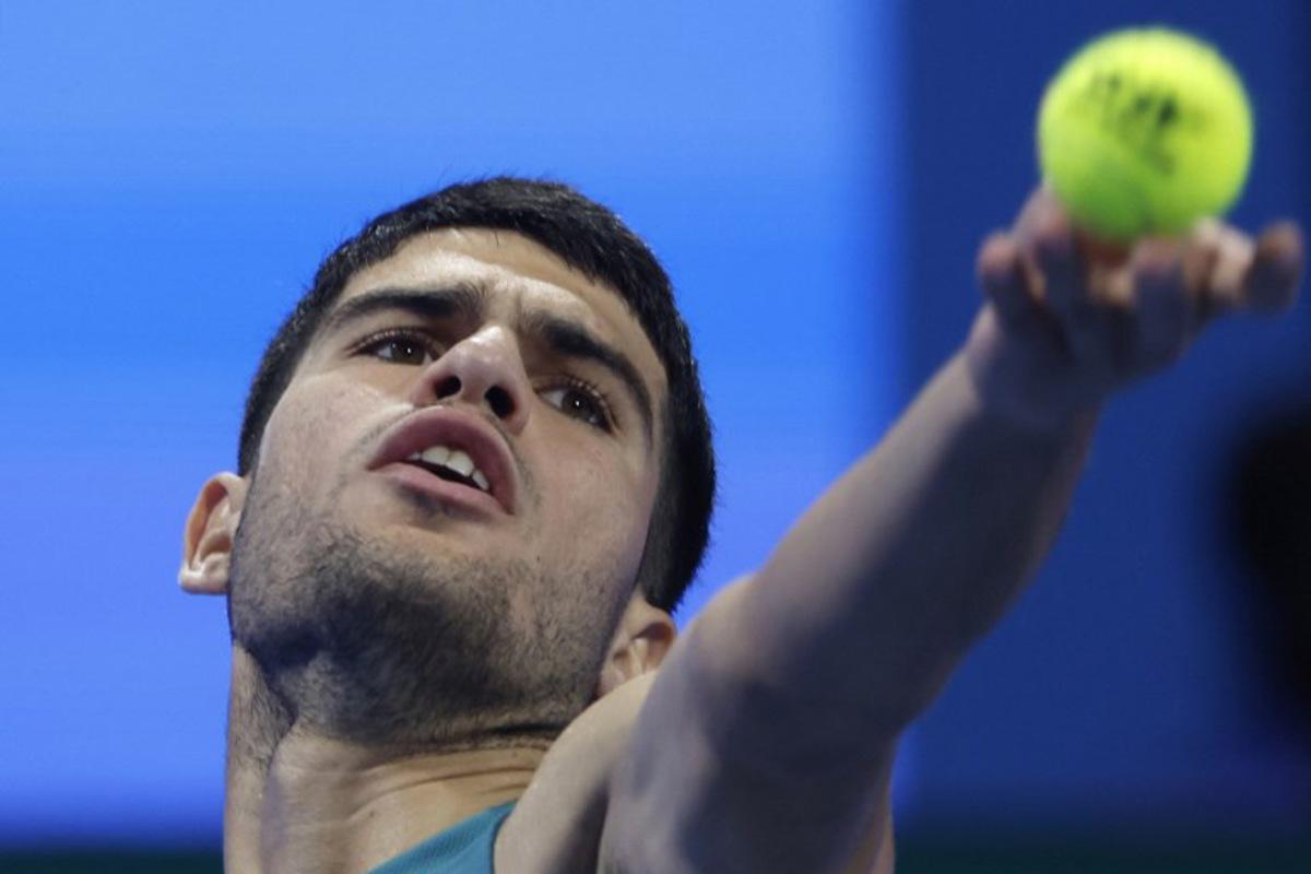 Spain's Carlos Alcaraz serves the ball to Croatia's Marin Cilic during their men's singles match at the ATP Qatar Open tennis tournament in Doha on February 17, 2025..  KARIM JAAFAR / AFP