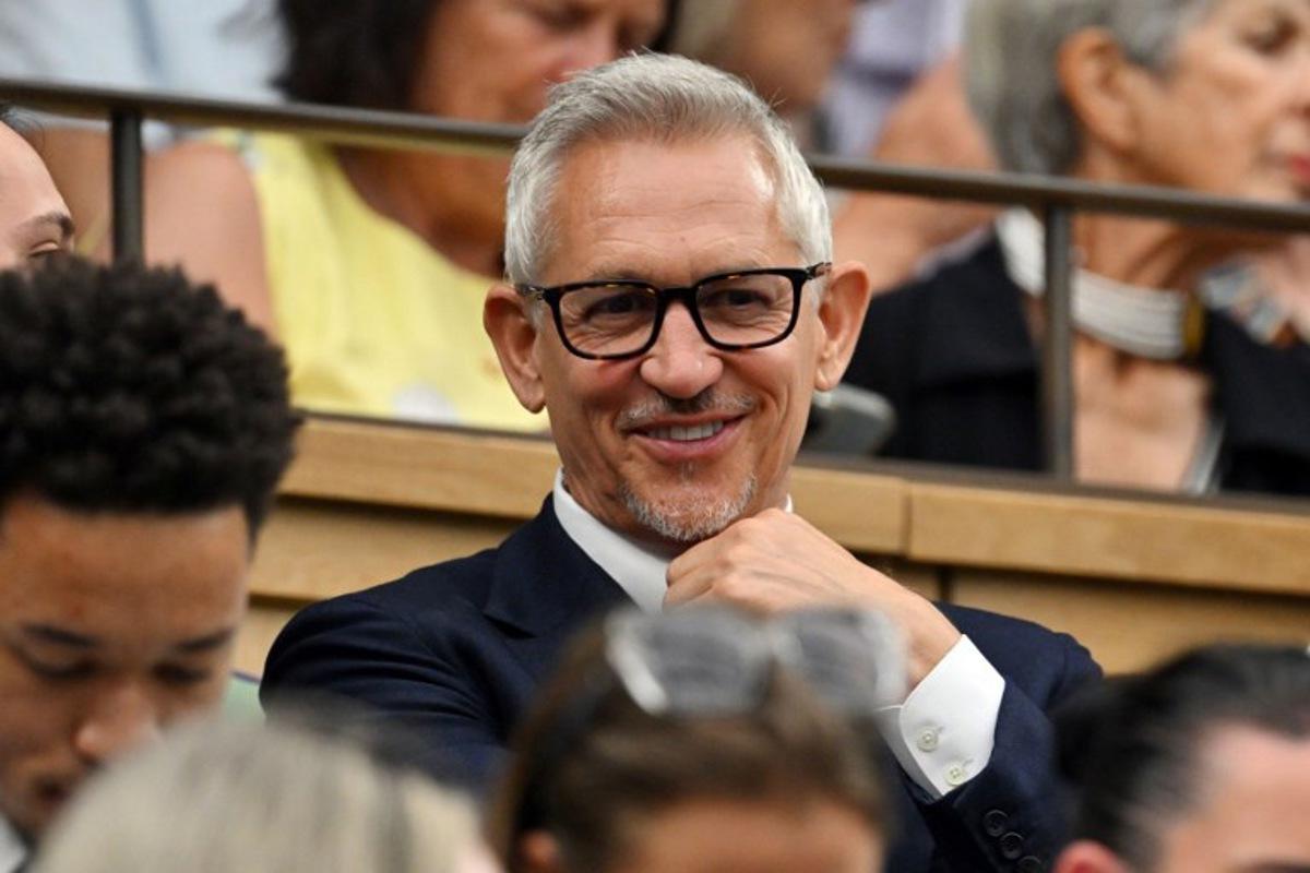 Television presenter Gary Lineker smiles at the Centre Court's Royal Box, on the sixth day of the 2023 Wimbledon Championships at The All England Tennis Club in Wimbledon, southwest London, on July 8, 2023.   Glyn KIRK / AFP