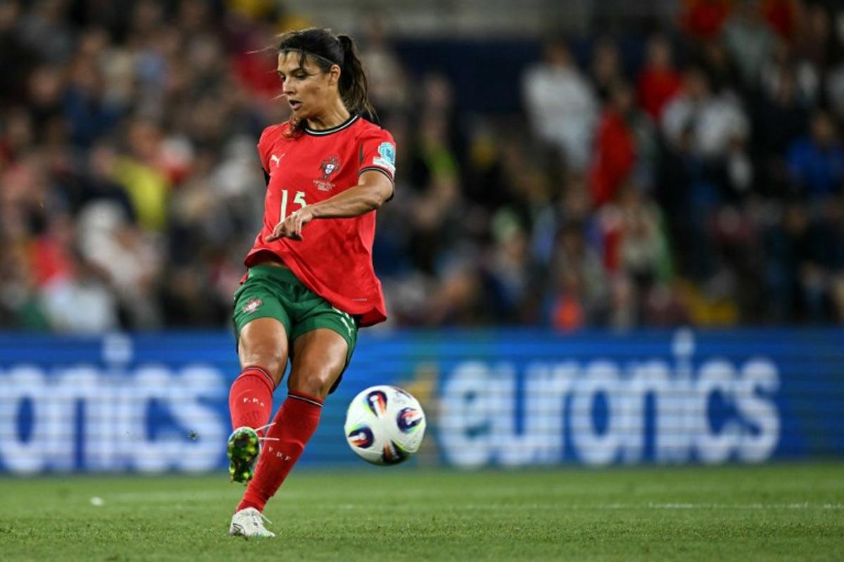 Portugal's defender #15 Carole Costa controls the ball during the UEFA Women's Euro 2025 Group B football match between Portugal and Italy at the Stade de Geneve in Geneva, on July 7, 2025.  Fabrice COFFRINI / AFP