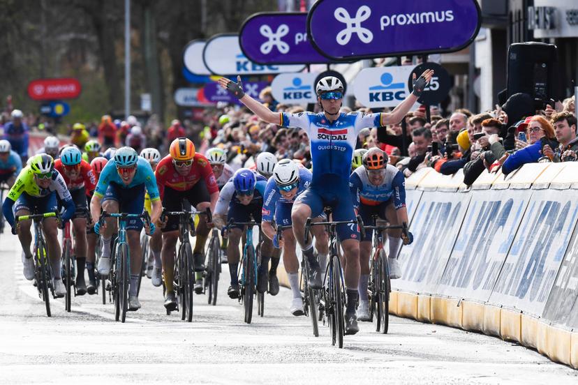 Belgian Tim Merlier of Soudal Quick-Step celebrates as he crosses the finish line to win the start of the men's race of the 112th edition of the 'Scheldeprijs' one day cycling event, 205,3 km from Terneuzen, the Netherlands to Schoten, Belgium on Wednesday 03 April 2024. BELGA PHOTO MARC GOYVAERTS