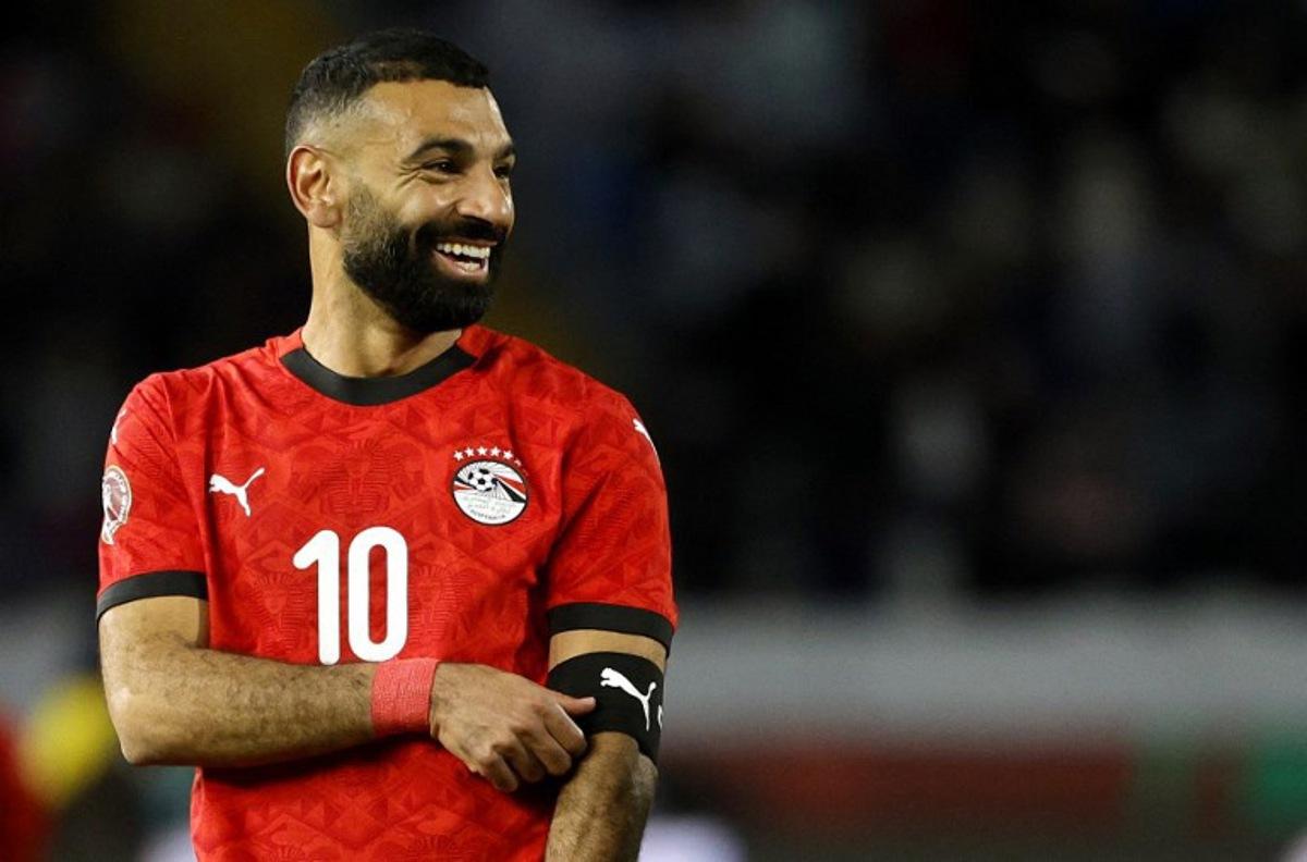 Egypt's forward #10 Mohamed Salah removes the captain's armband during the Africa Cup of Nations (CAN) third place football match between Egypt and Nigeria at the Mohammed V Stadium in Casablanca on January 17, 2026.   Abdel Majid BZIOUAT / AFP