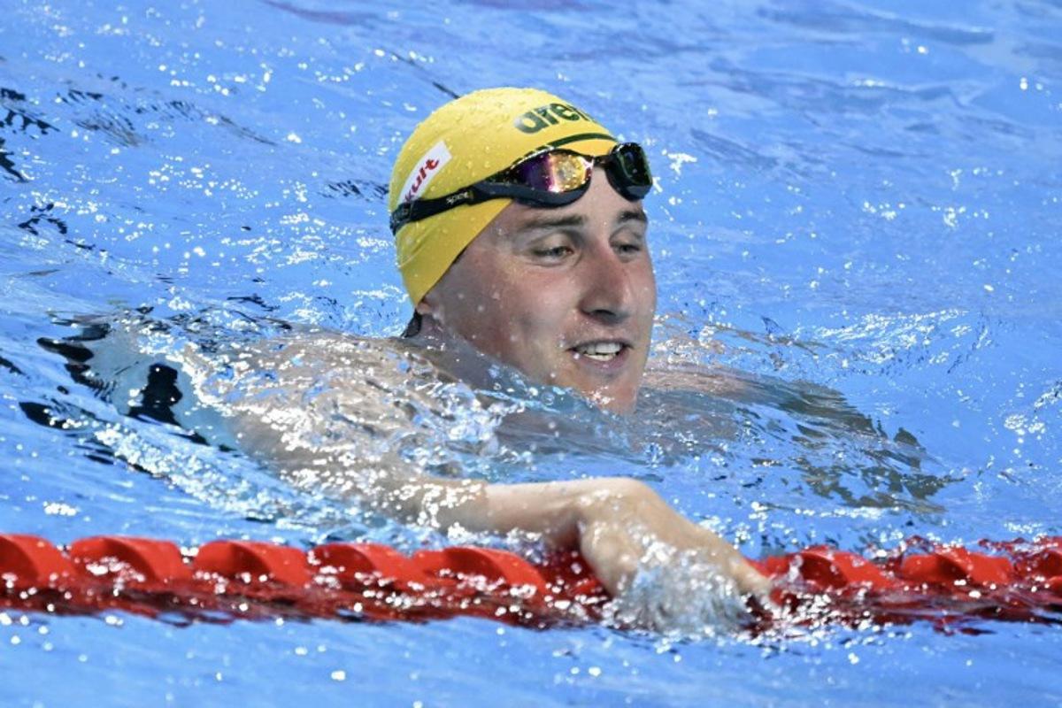 Australia's swimmer Cameron McEvoy celebrates winning the final of the men's 50m freestyle swimming event during the 2025 World Aquatics Championships in Singapore on August 2, 2025.  Oli SCARFF / AFP