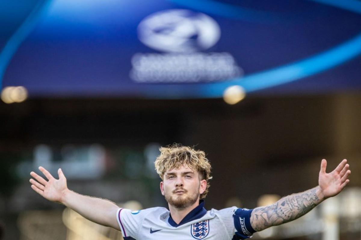 England's forward #19 Harvey Elliott celebrates after scoring the 2-1 goal during the UEFA U21 European Championship semi-final football match between England and The Netherlands in Bratislava, Slovakia on June 25, 2025.  TOMAS BENEDIKOVIC / AFP