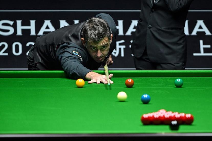 Britain's Ronnie O'Sullivan plays a shot during his match against Chinese Zhou Jinhao at the Shanghai Masters snooker tournament in Shanghai on July 16, 2024.  Hector RETAMAL / AFP
