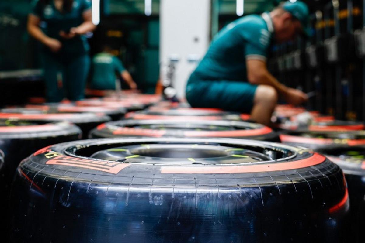 Aston Martin staff check tyres in their workshop at the paddock ahead of the Formula One Belgian Grand Prix at the Spa-Francorchamps Circuit in Spa, on July 25, 2024.  SIMON WOLFHART / STR / AFP