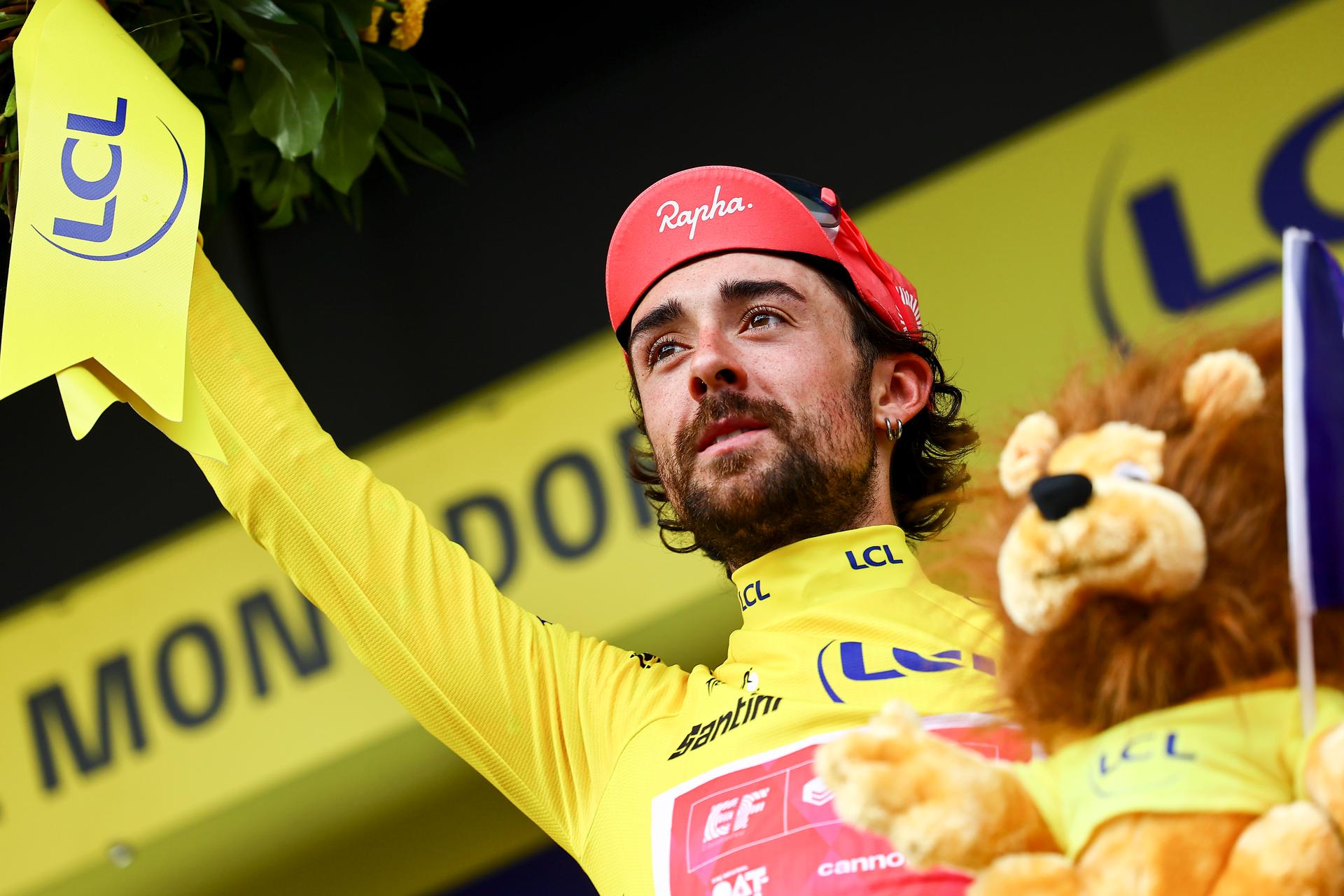 Irish Ben Healy of EF Education-EasyPost celebrates on the podium in the yellow jersey of leader in the overall ranking after stage 10 of the 2025 Tour de France cycling, from Ennezat to Le Mont-Dore Puy de Sancy (169 km), on Monday 14 July 2025 in France. The 112th edition of the Tour de France starts on Saturday 5 July in Lille, France, and will finish in Paris, France on the 27th of July. BELGA PHOTO DAVID PINTENS