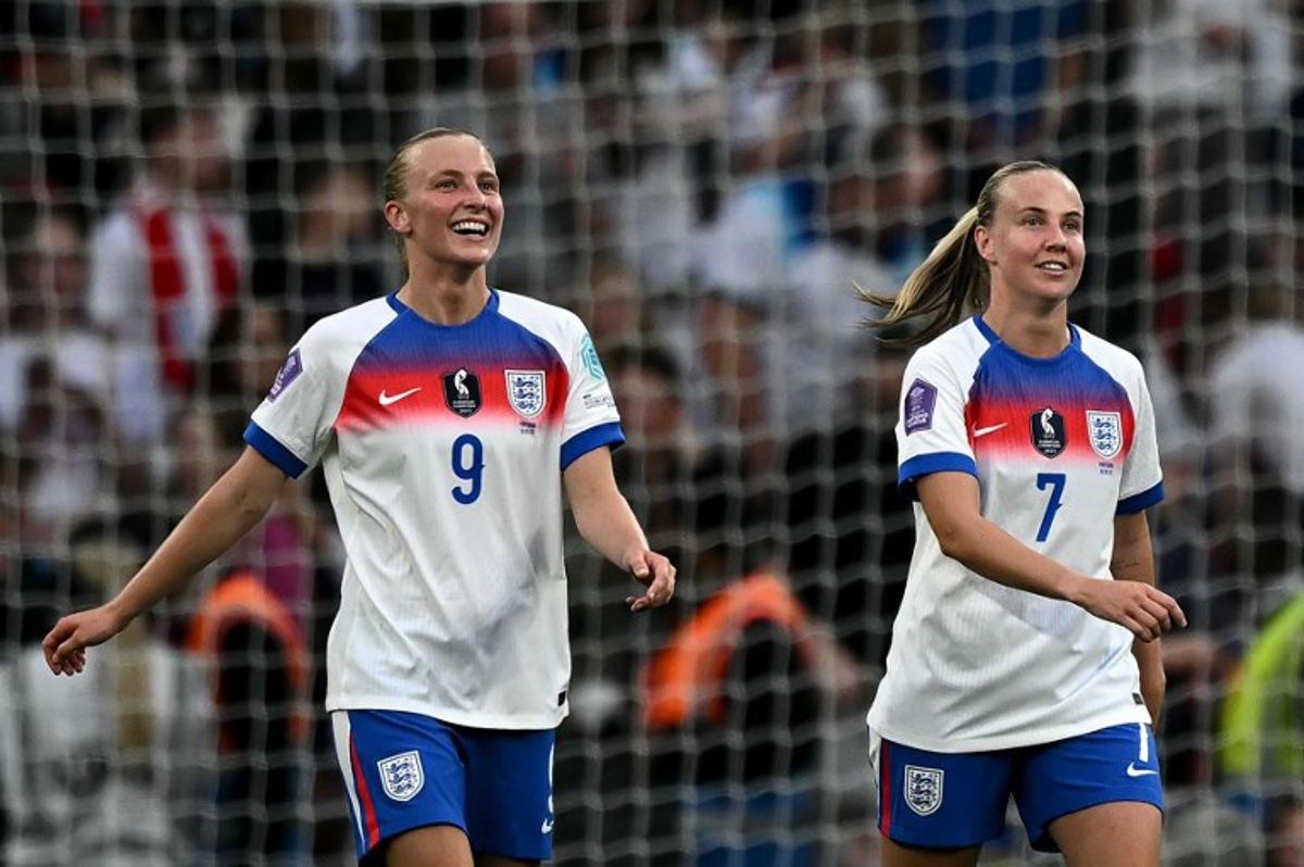 England's striker#07 Beth Mead (R) celebrates scoring the team's fourth goal with England's striker #09 Aggie Beever-Jones during the UEFA Women's Nations League Group A3 football match between England and Portugal at Wembley Stadium in London on May 30, 2025.   Ben STANSALL / AFP