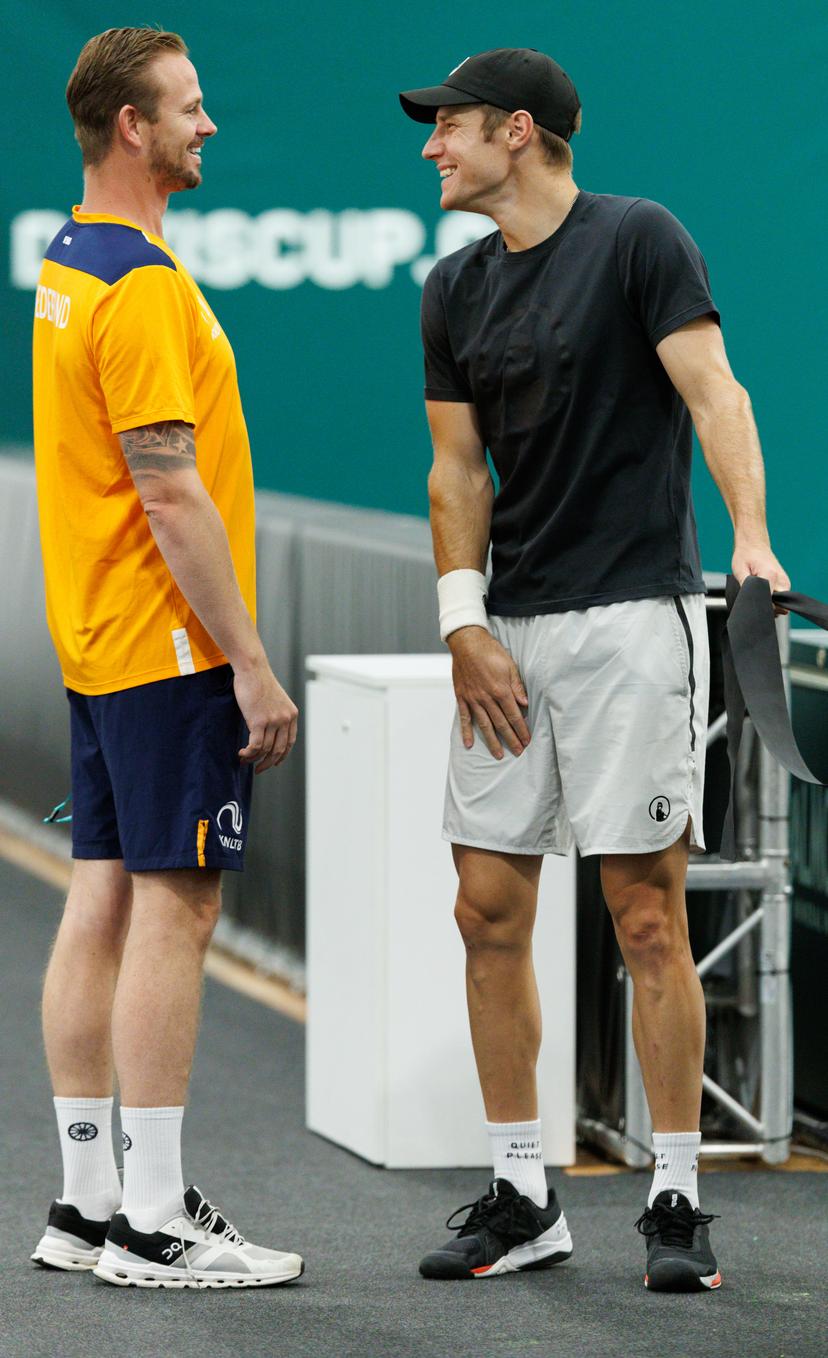 Dutch Griekspoor's coach Belgian Kristof Vliegen and Belgian Joris De Loore pictured during a training session, ahead of the second game in the group A of the Davis Cup Finals group stage, Wednesday 11 September 2024, at the Unipol Arena, in Bologna, Italy. BELGA PHOTO BENOIT DOPPAGNE