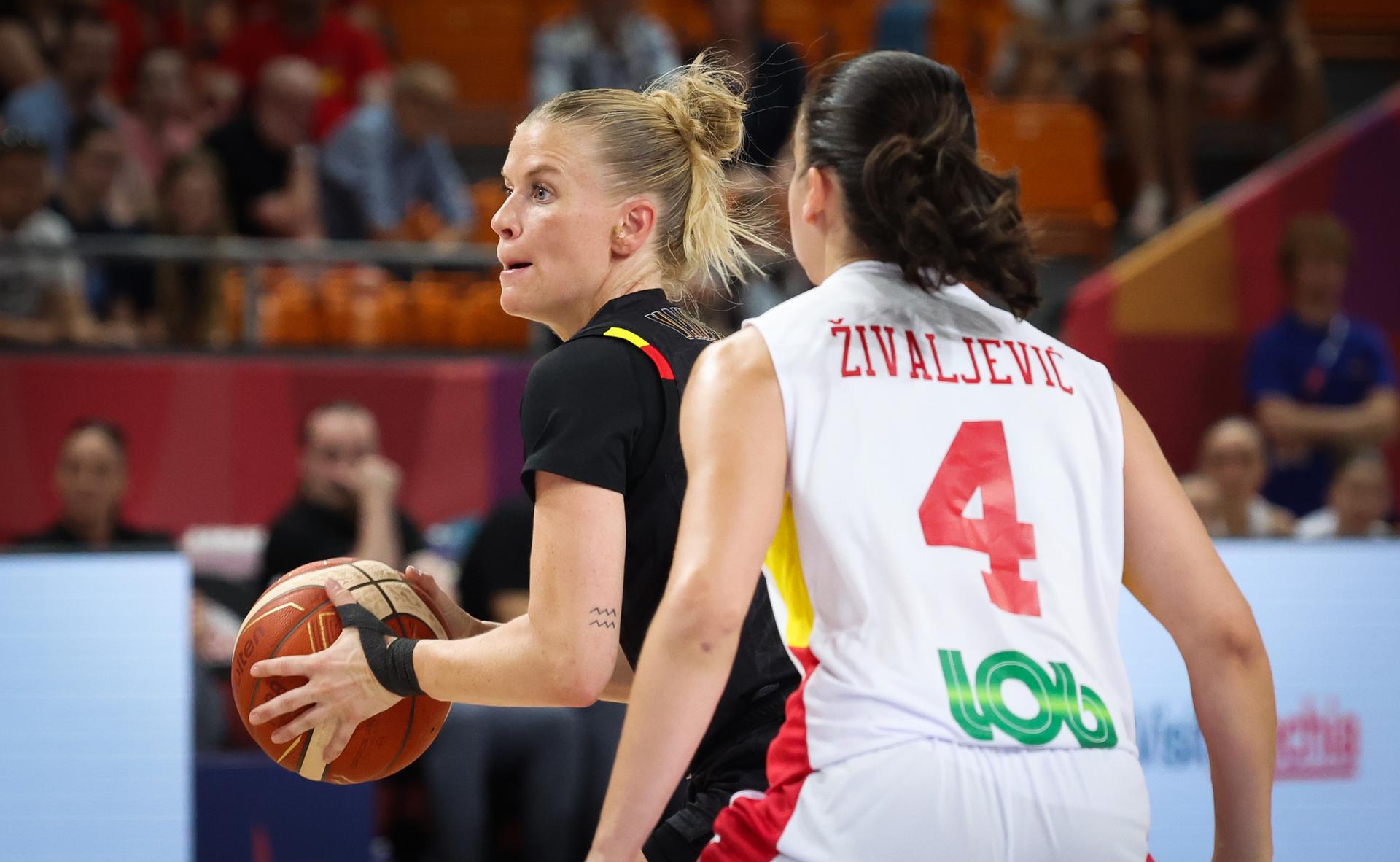 Belgium's Julie Vanloo fights for the ball during the second game in the group stage (group C) between Montenegro and Belgian national women team 'the Belgian Cats', in Brno, Czech Republlic, on Friday 20 June 2025, at the FIBA Women's EuroBasket 2025. BELGA PHOTO VIRGINIE LEFOUR