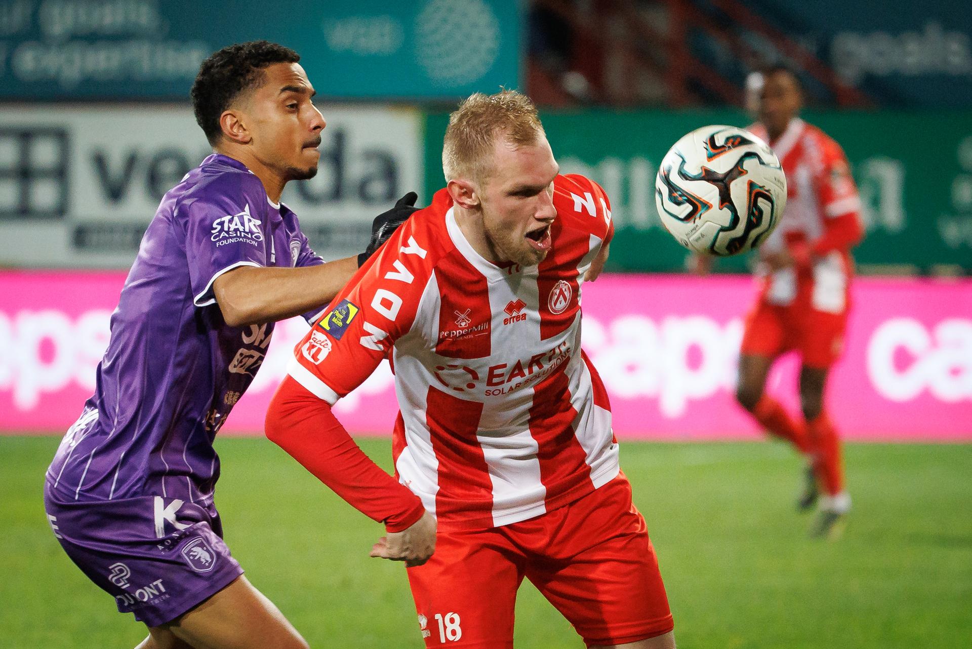 Beerschot's Colin Dagba and Kortrijk's Jellert Van Landschoot fight for the ball during a soccer game between KV Kortrijk and Beerschot VA, Saturday 14 February 2026 in Kortrijk, on day 25 of the 2025-2026 'Challenger Pro League' 1B second division of the Belgian championship. BELGA PHOTO KURT DESPLENTER