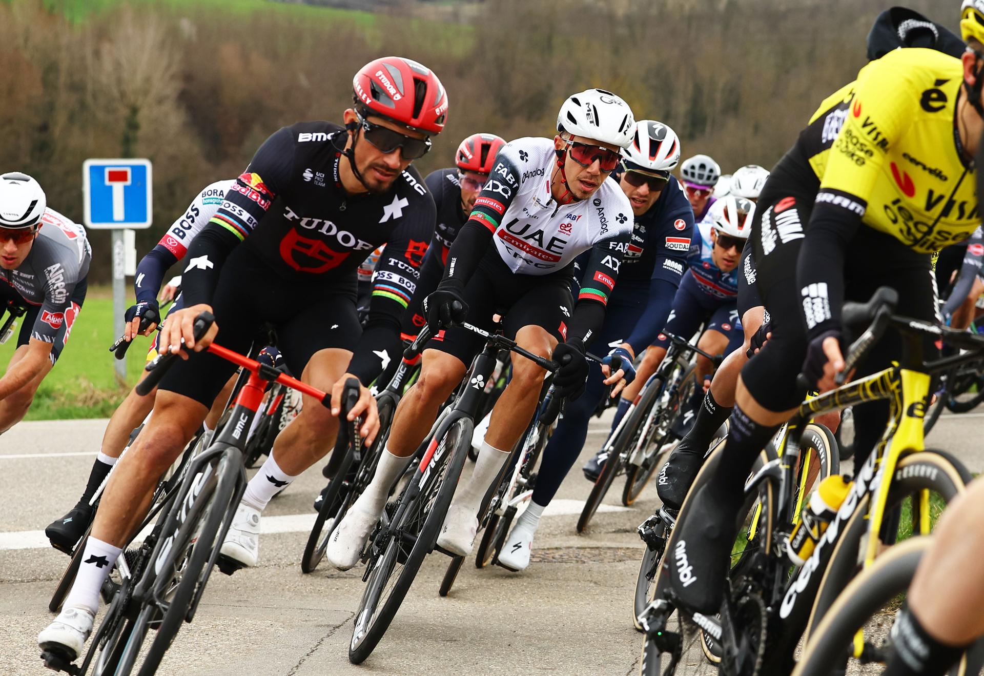 French Julian Alaphilippe of Tudor Pro Cycling Team and Portuguese Ivo Oliveira of UAE Team Emirates pictured in action during stage five of the 83th edition of the Paris-Nice cycling race, 196,5 km from Saint-Just-en-Chevalet to La Cote-Saint-Andre, France, Thursday 13 March 2025. BELGA PHOTO DAVID PINTENS