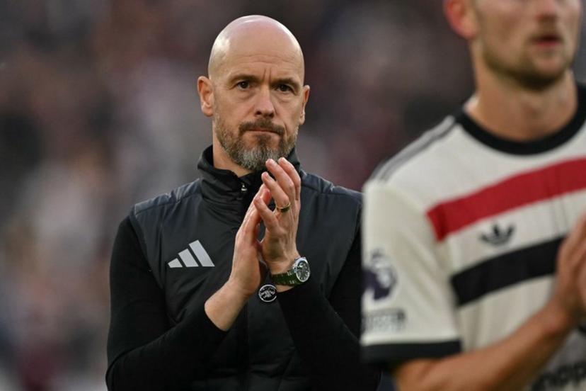 Manchester United's Dutch manager Erik ten Hag applauds fans after the English Premier League football match between West Ham United and Manchester United at the London Stadium, in London on October 27, 2024. West Ham won the game 2-1. Glyn KIRK / AFP