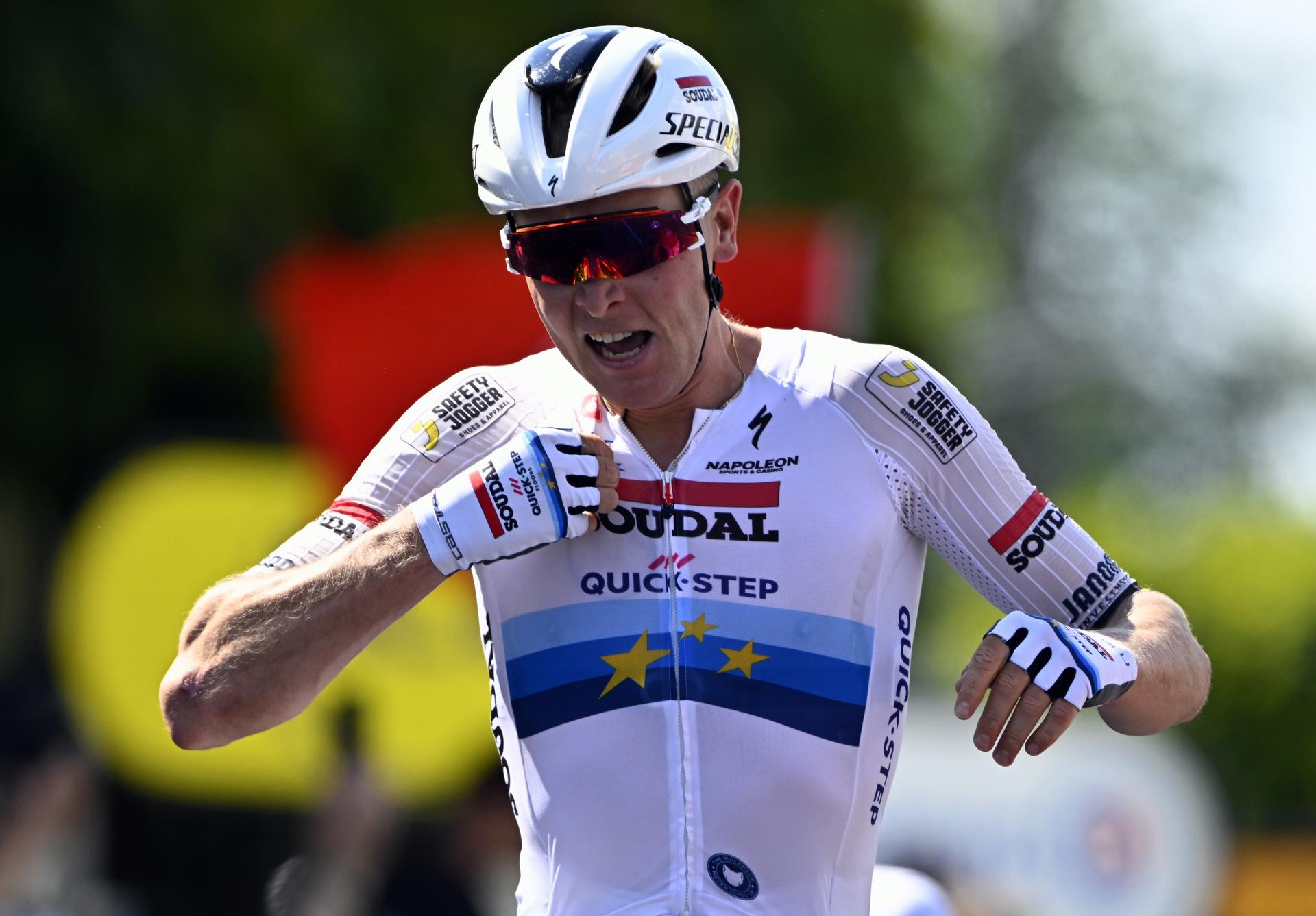 Belgian Tim Merlier of Soudal Quick-Step celebrates as he crosses the finish line to win stage nine of the 2025 Tour de France cycling, from Chinon to Chateauroux (170 km), on Sunday 13 July 2025 in France. The 112th edition of the Tour de France starts on Saturday 5 July in Lille, France, and will finish in Paris, France on the 27th of July. BELGA PHOTO JASPER JACOBS