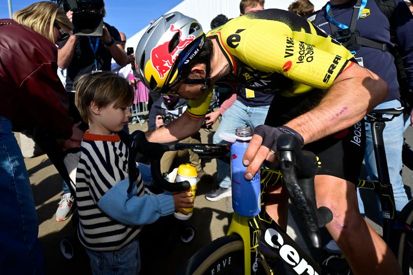 Belgian Wout van Aert of Team Visma-Lease a Bike, his wife Sarah De Bie and his son Jerome celebrate after the men's race of the 'Ronde van Vlaanderen/ Tour des Flandres/ Tour of Flanders' one day cycling race, 268,9km from Brugge to Oudenaarde, Sunday 06 April 2025. BELGA PHOTO DIRK WAEM