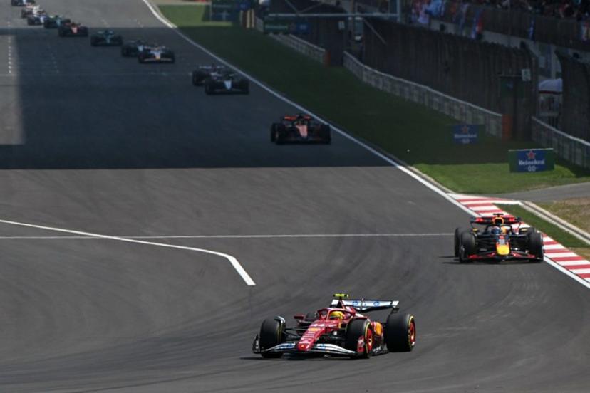Ferrari's British driver Lewis Hamilton (bottom C) leads the sprint race of the Formula One Chinese Grand Prix at the Shanghai International Circuit in Shanghai on March 22, 2025.  Greg Baker / AFP