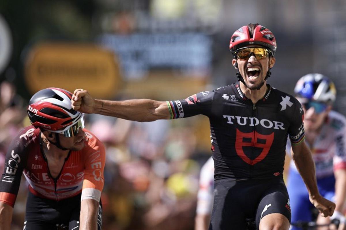 Tudor Pro Cycling Team's French rider Julian Alaphilippe cycles to the finish line to place third in the 15th stage of the 112th edition of the Tour de France cycling race, 169.3 km between Muret and Carcassonne, southwestern France, on July 20, 2025.  Anne-Christine POUJOULAT / AFP