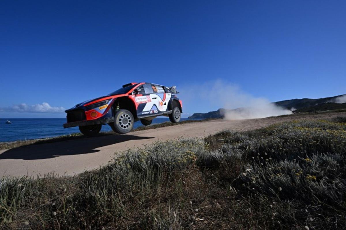 Belgium driver Thierry Neuville steers his Hyundai assisted by his co-driver Martijn Wydaeghe, on June 2, 2024 during the SS14 special between Sassari and Argentiera, of the Rally of Sardegna, 5th round of the FIA World Rally Championship.  Andreas SOLARO / AFP