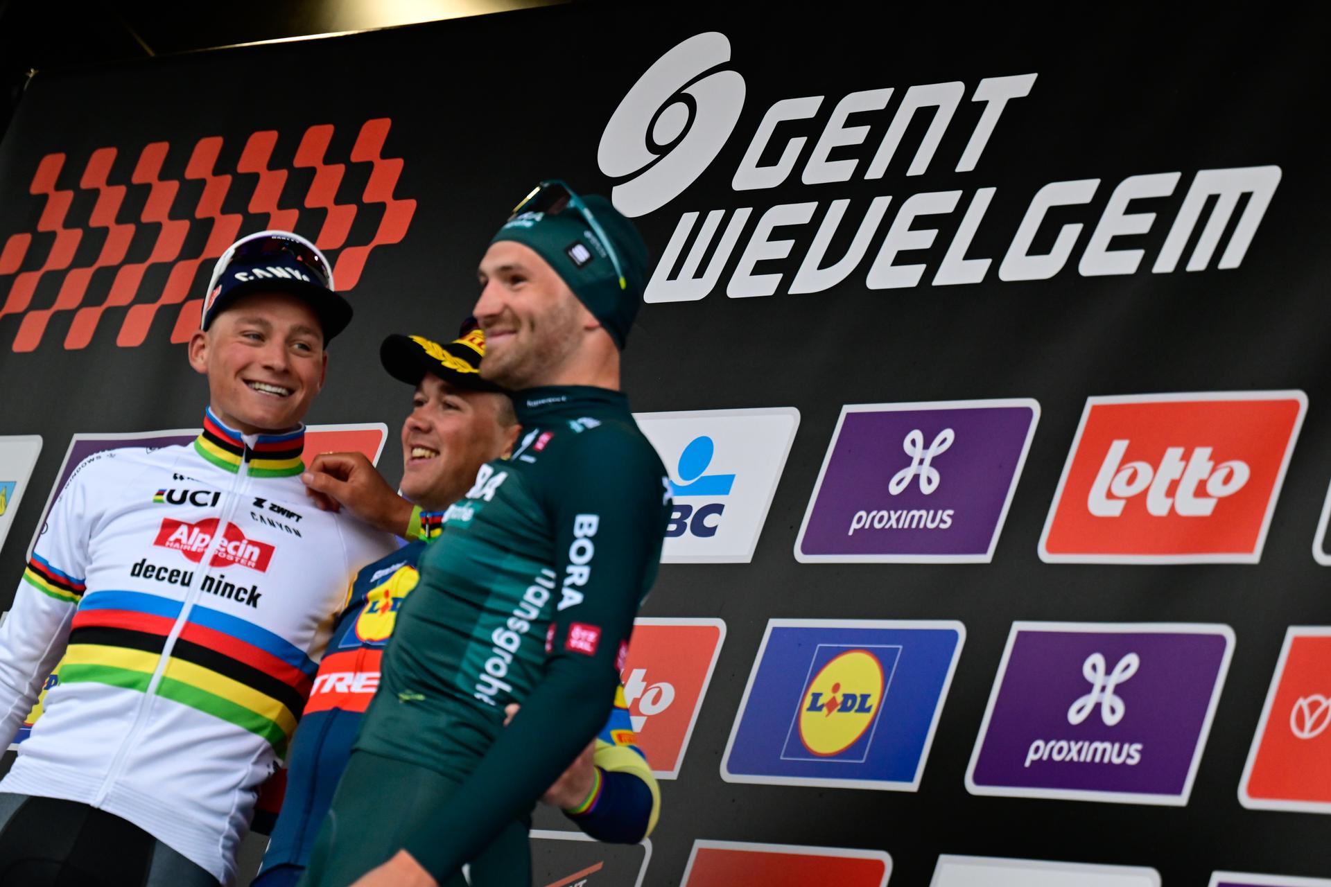 Dutch Mathieu van der Poel of Alpecin-Deceuninck, Danish Mads Pedersen of Lidl-Trek and Belgian Jordi Meeus of Bora-Hansgrohe celebrate on the podium after the men's Gent-Wevelgem - In Flanders Fields cycling race, 253.1 km from Ieper to Wevelgem, Sunday 24 March 2024. BELGA PHOTO ERIC LALMAND