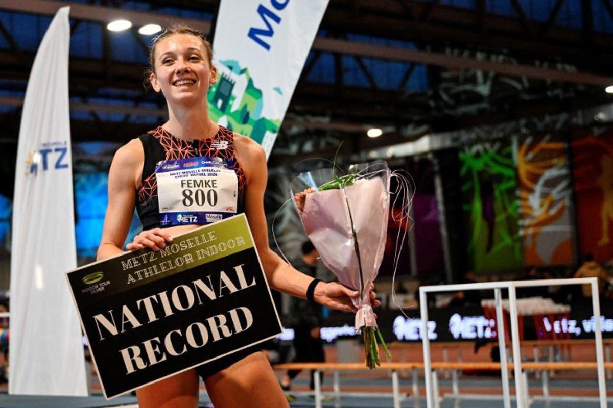 Netherlands' athlete Femke Bol celebrates after winning the women's 800m final during the Athlelor indoor meeting at L'Anneau athletics hall in Metz on February 8, 2026.  On October 10, 2025, Femke Bol announced her retirement from the 400-meter hurdles, the event in which she is a two-time world champion. The 25-year-old athlete then announced her intention to focus on the 800 meters. Jean-Christophe VERHAEGEN / AFP