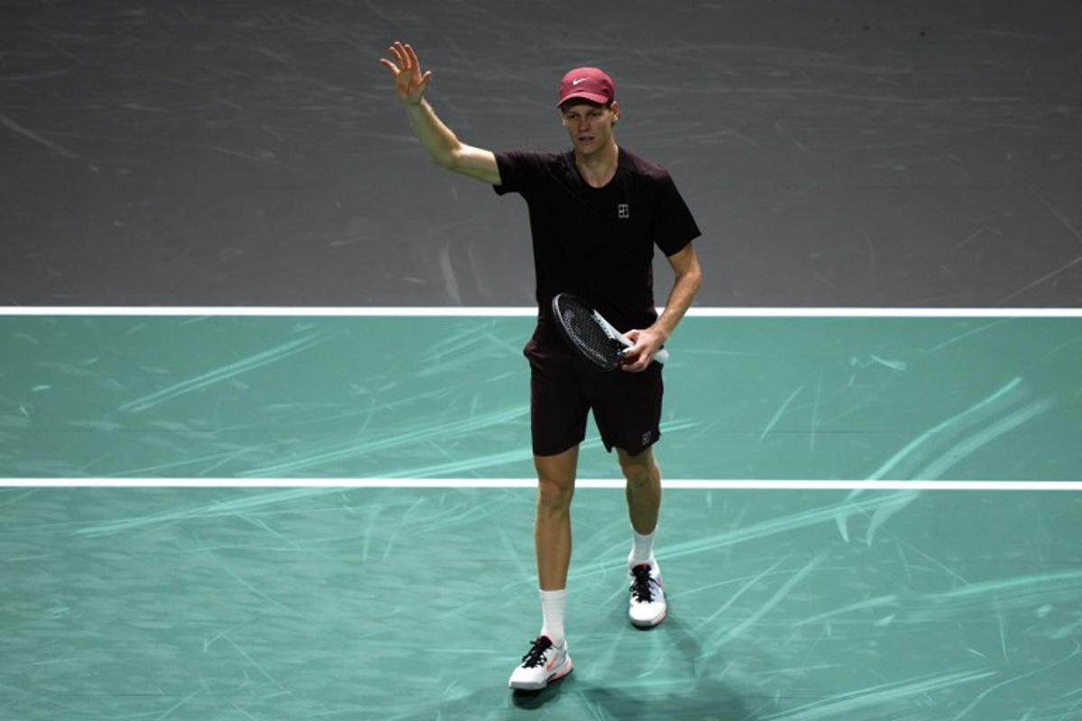 Italy's Jannik Sinner celebrates after winning against US Ben Shelton at the end of their men's singles quarter-final match on day five of the Paris ATP Masters 1000 tennis tournament at the Paris La Défense Arena in Nanterre, on the outskirts of Paris, on October 31, 2025.  Dimitar DILKOFF / AFP