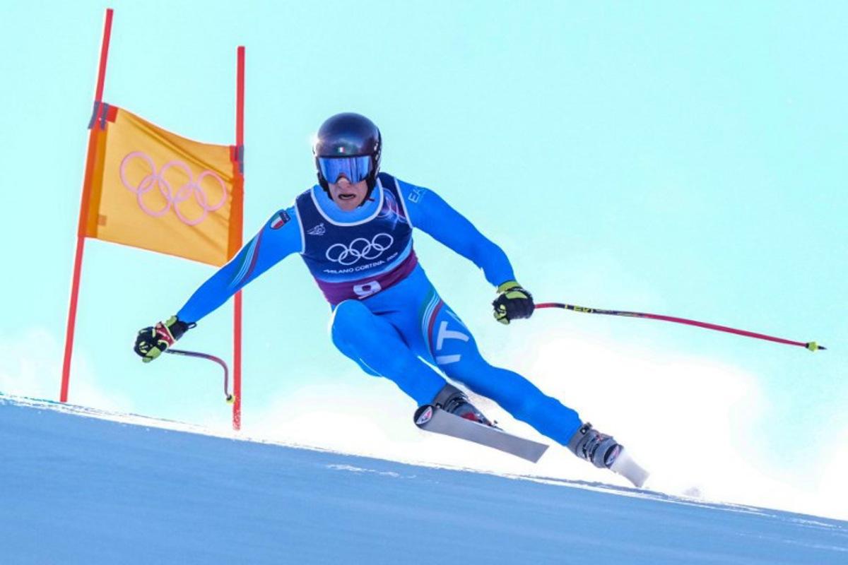 Italy's Giovanni Franzoni competes in the downhill run of the men's team combined alpine skiing event during the Milano Cortina 2026 Winter Olympic Games at the Stelvio Ski Centre in Bormio (Valtellina) on February 9, 2026.  Dimitar DILKOFF / AFP
