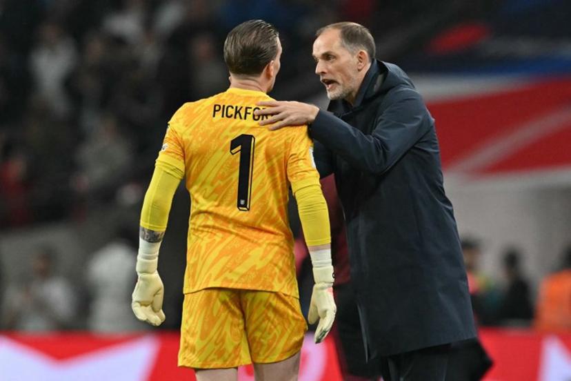 England's German head coach Thomas Tuchel speaks with England's goalkeeper #01 Jordan Pickford during the 2026 World Cup Group K qualifier football match between England and Albania, at Wembley stadium in London, on March 21, 2025.   Glyn KIRK / AFP