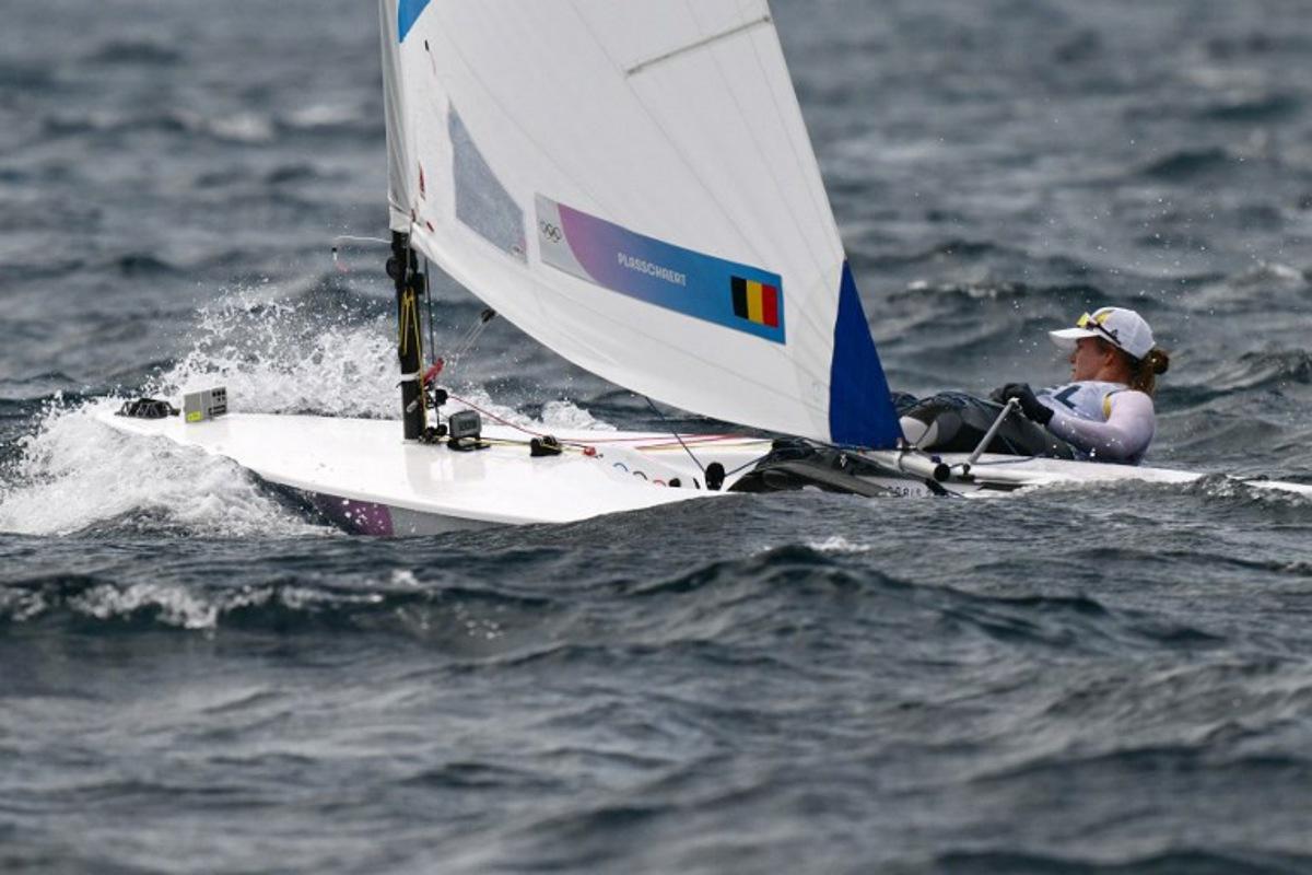 Belgium's Emma Plasschaert competes in the medal race of the women's ILCA 6 single-handed dinghy event during the Paris 2024 Olympic Games sailing competition at the Roucas-Blanc Marina in Marseille on August 7, 2024.   Christophe SIMON / AFP