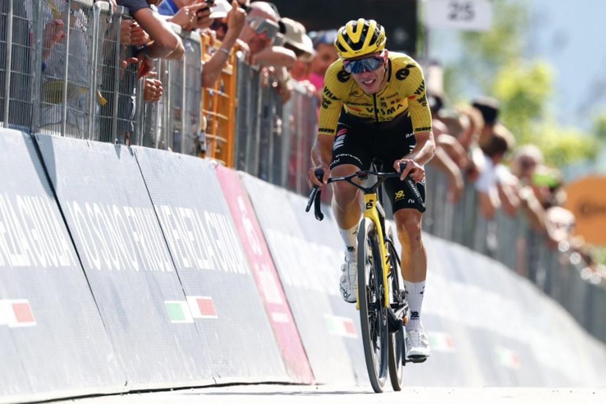 Team Visma Lease a Bike Italian rider Davide Piganzoli crosses the finish line of the 19th stage of the Giro d'Italia 2026 - Tour of Italy cycling race between Feltre and Alleghe, Italy, on May 29, 2026.  Luca Bettini / AFP