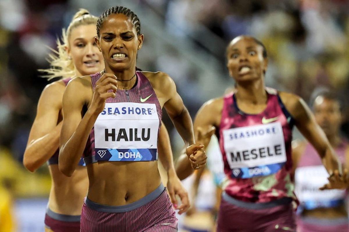 Ethiopia's Freweyni Hailu approaches the finish line in the women's 1500m final race during the IAAF Diamond League competition on May 10, 2024 at the Suheim Bin Hamad Stadium in the Qatari capital Doha.  KARIM JAAFAR / AFP