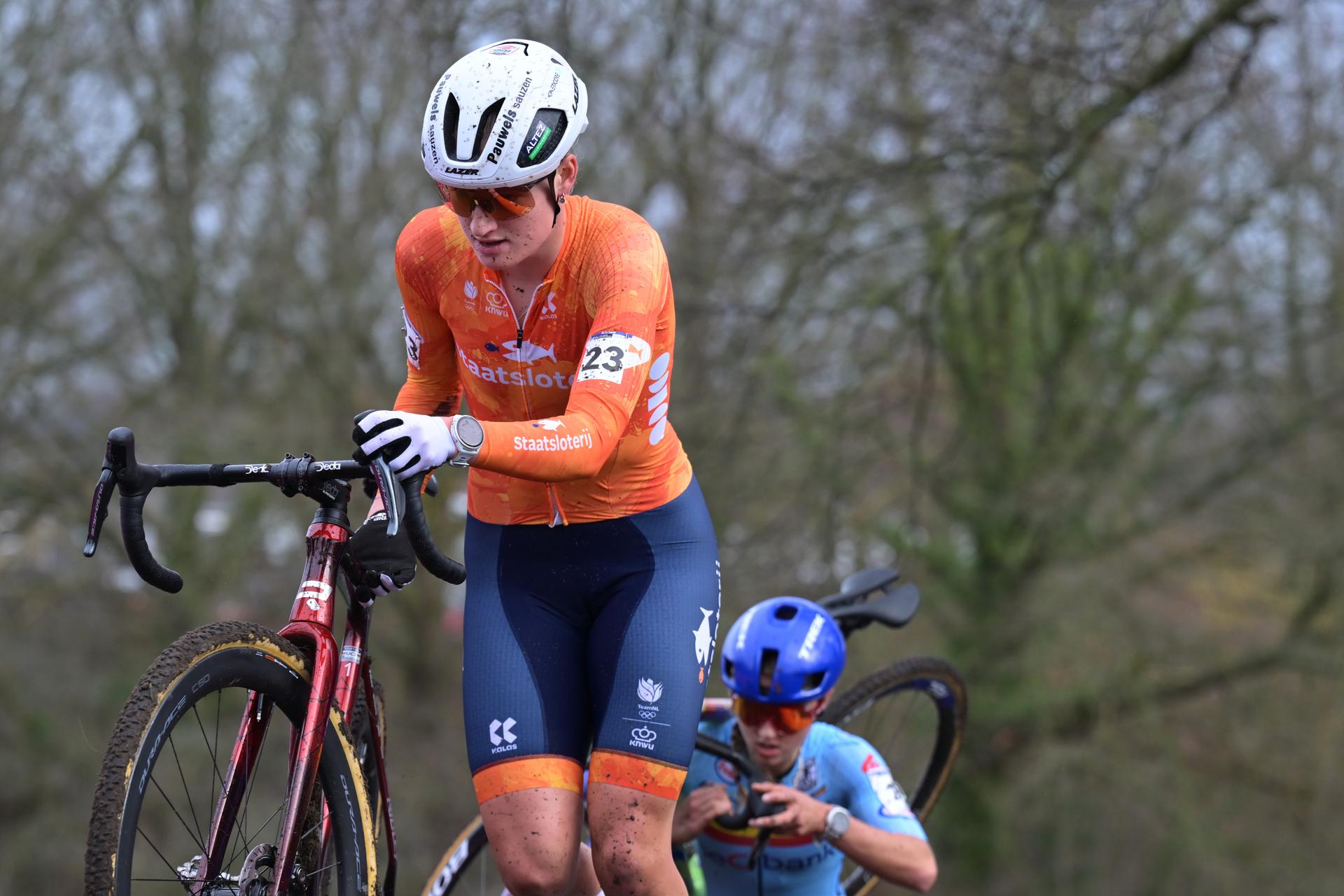 Dutch Leonie Bentveld and Belgian Fleur Moors pictured in action during the U23 women race at UCI Cyclocross World Championships, on Sunday 01 February 2026, in Hulst, The Netherlands. BELGA PHOTO DAVID PINTENS