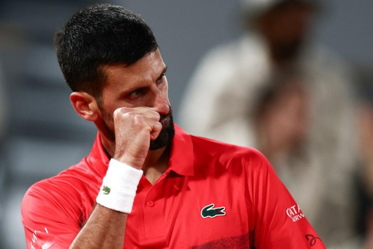 Serbia's Novak Djokovic reacts after a point during his men's singles quarter-final match against Germany's Alexander Zverev on day 11 of the French Open tennis tournament on Court Philippe-Chatrier at the Roland-Garros Complex in Paris on June 4, 2025.  Thibaud MORITZ / AFP